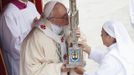 Pope Francis kisses the relics of Maria Guadalupe Garcia Zavala, a candidate for sainthood, as he leads a canonization mass in Saint Peter's Square at the Vatican