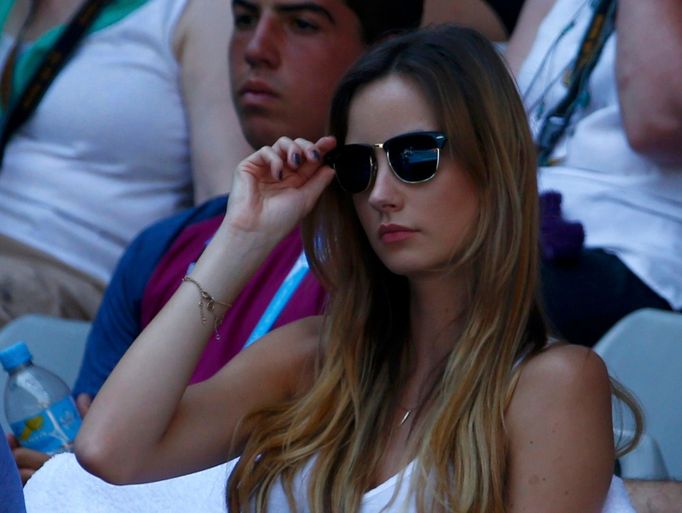 Ester Satorova, the girlfriend of Tomas Berdych of Czech Republic, is seen during his men's singles match at the Australian Open 2014 tennis tournament in Melbourne