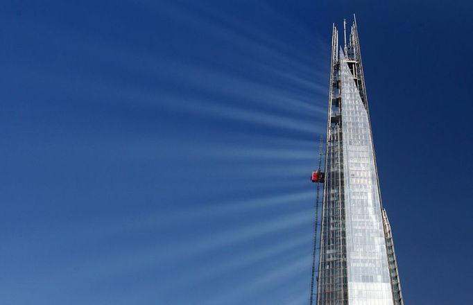 File photo dated 30/5/2012 of Sunlight reflects off The Shard in central London as construction continues on the building.