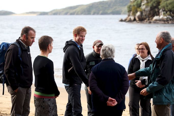 Britain's Prince Harry and Department on Conservation manager Brent heaven meet with Ulva Island Trustees and the Hunter family at Sydney Cove on Ulva Island off the coas