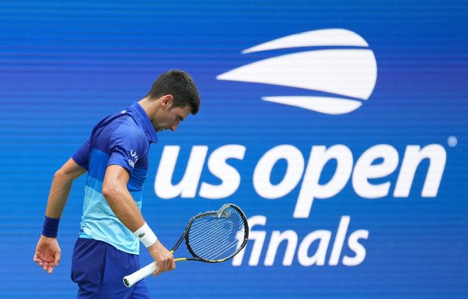 Sep 12, 2021; Flushing, NY, USA; Novak Djokovic of Serbia reacts after smashing his racket in the second set of the match against Daniil Medvedev of Russia in the men's s