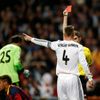 Referee Mallenco shows red card to Real Madrid's Ramos during La Liga's second 'Clasico' soccer match of the season in Madrid