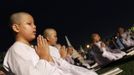 Novice Thai nuns pray at the Sathira Dammasathan Buddhist meditation centre in Bangkok