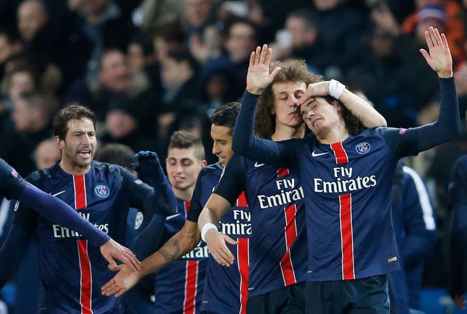 Edinson Cavani celebrates scoring the second goal for Paris St Germain