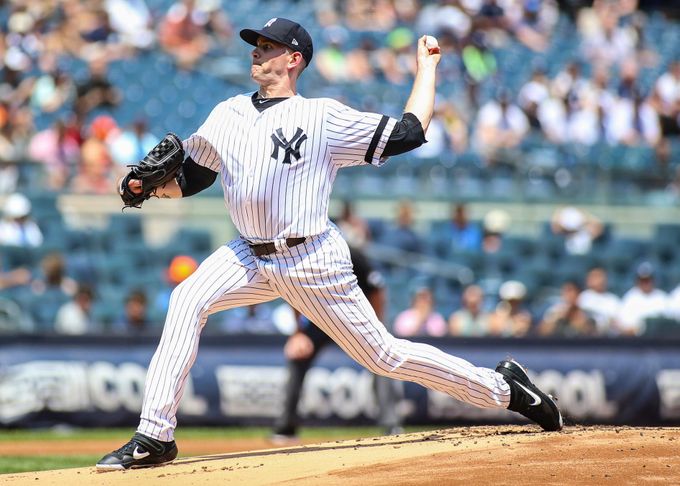Jul 21, 2019; Bronx, NY, USA; New York Yankees pitcher James Paxton (65) pitches in the first inning against the Colorado Rockies at Yankee Stadium. Mandatory Credit: Wen