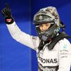 Mercedes Formula One driver Nico Rosberg of Germany celebrates after taking pole position at the qualifying session of the Bahrain F1 Grand Prix at the Bahrain International Circuit (BIC) in Sakhir