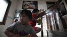 Lee On-u (L), 6, and Lee Jin-ri, 5, play at the Joosarang church in Seoul September 20, 2012. The two disabled children had been abandoned at a "baby box" at the church and has been there raised since. Pastor Lee Jong-rak, who runs the "baby box" where mothers can leave unwanted infants, has seen a sharp increase in the number of newborns being left there because, the pastor says, of a new law aimed protecting the rights of children. South Korea is trying to shed a reputation of being a source of babies for adoption by people abroad. It is encouraging domestic adoption and tightening up the process of a child's transfer from birth mother to adoptive parents. Picture taken September 20, 2012. REUTERS/Kim Hong-Ji (SOUTH KOREA - Tags: SOCIETY) Published: Říj. 7, 2012, 6:56 dop.