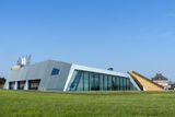 Stavbou roku 2014 je i Letecké muzeum Metoděje Vlacha v Mladé Boleslavi. Unikátnost projektu, který navrhla firma Hlaváček - architekti, spočívá podle porotců v tom, že se jedná o “živé muzeum” s interaktivními prvky.