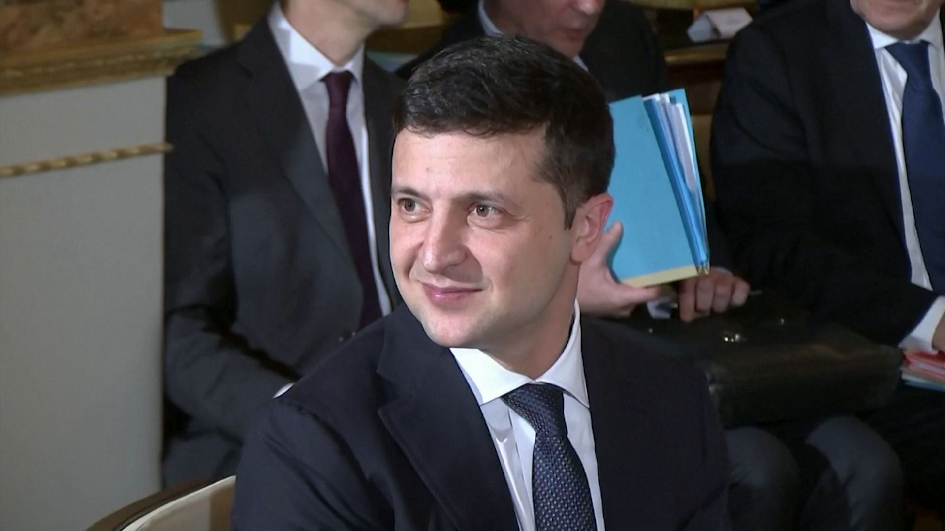 Prezident Zelenskyj na pokyn Putina usměje do kamery