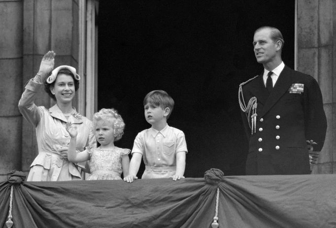 FILE - This is a May 15, 1954 file photo of of Prince Charles and Princess Anne with their parents, Queen Elizabeth II and Duke of Edinburgh, on the balcony of Buckingham