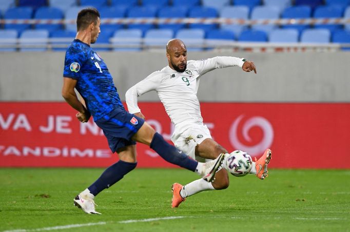 David McGoldrick in action with Slovakia’s Martin Valjent