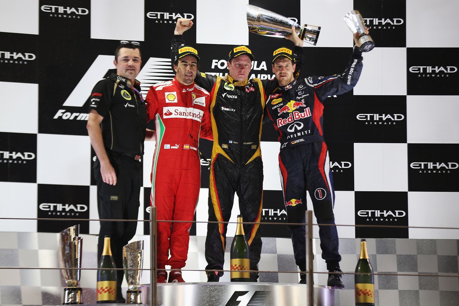 Fernando Alonso, Ferrari; Kimi Räikkönen, Lotus; Sebastian Vettel, Red Bull