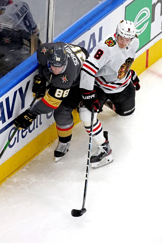 Aug 18, 2020; Edmonton, Alberta, CAN; xxxxxxx in game five of the first round of the Chicago Blackhawks left wing Dominik Kubalik (8) and Vegas Golden Knights defenseman