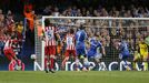 Atletico Madrid's Adrian Lopez (L) scores a goal against Chelsea during their Champion's League semi-final second leg soccer match at Stamford Bridge in London April 30,