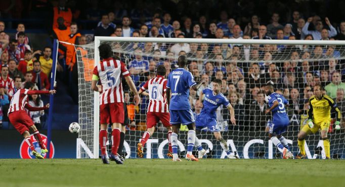 Atletico Madrid's Adrian Lopez (L) scores a goal against Chelsea during their Champion's League semi-final second leg soccer match at Stamford Bridge in London April 30,