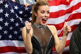Američanka Ashley Wagnerová se tváří, jako kdyby právě vyhrála olympiádu, ale ve skutečnosti to bylo "jen" čtvrté místo v krátkém programu žen v rámci týmové soutěže.