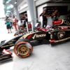 Lotus Formula One driver Grosjean leaves the garage during the second practice session of the Malaysian F1 Grand Prix at Sepang International Circuit outside Kuala Lumpur