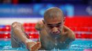 Paris 2024 Paralympics - Swimming - Men's 50m Butterfly - S5 Heats - Paris La Defense Arena, Nanterre, France - September 6, 2024 Jincheng Guo of China reacts after winni