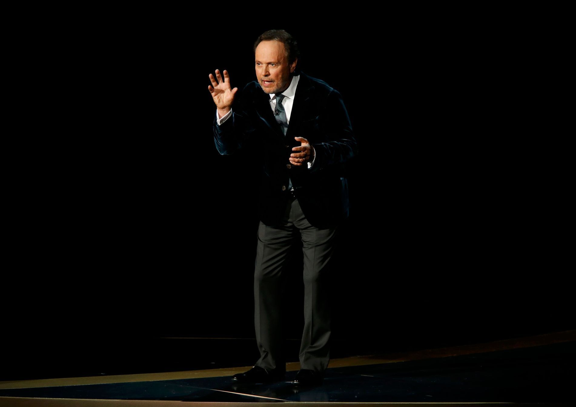 Billy Crystal pays tribute to Robin Williams during the 66th Primetime Emmy Awards in Los Angeles