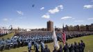 Helicopters fly over as Massachusetts Institute of Technology Police are joined by U.S. Vice President Joe Biden during a memorial service for MIT Patrol Officer Sean Collier at MIT in Cambridge, Massachusetts April 24, 2013. Thousands of law enforcement agents from around the United States attended the memorial for Collier, who authorities say was shot dead by the Boston Marathon bombing suspects. REUTERS/Dominick Reuter/MIT/Handout (UNITED STATES - Tags: CIVIL UNREST CRIME LAW) NO SALES. NO ARCHIVES. FOR EDITORIAL USE ONLY. NOT FOR SALE FOR MARKETING OR ADVERTISING CAMPAIGNS. THIS IMAGE HAS BEEN SUPPLIED BY A THIRD PARTY. IT IS DISTRIBUTED, EXACTLY AS RECEIVED BY REUTERS, AS A SERVICE TO CLIENTS Published: Dub. 24, 2013, 7:25 odp.