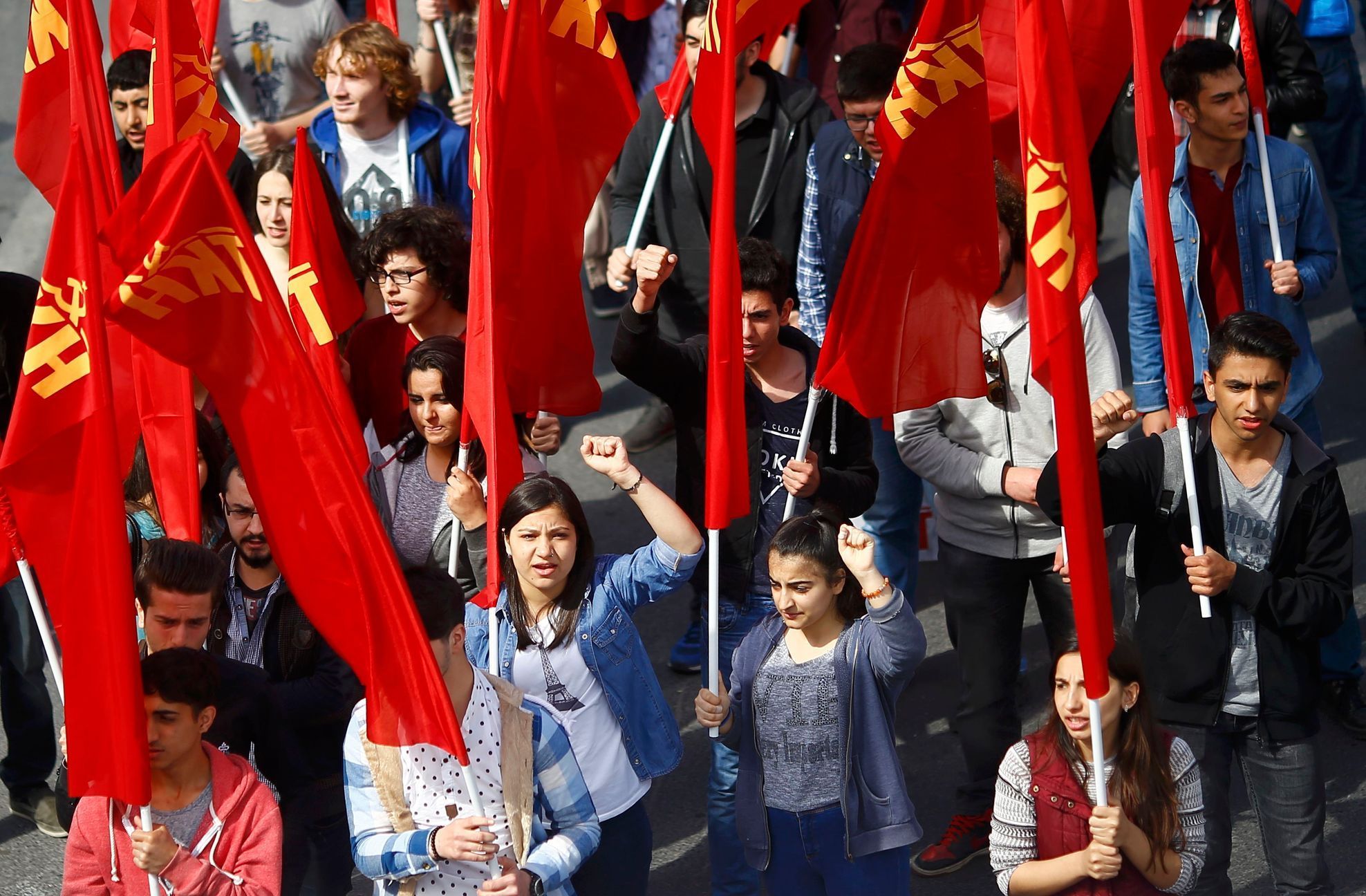 People march with flags during May Day demonstrations in Istanbul