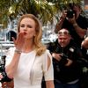 Cast member Nicole Kidman blows a kiss as she poses during a photocall for the film &quot;Grace of Monaco&quot; out of competition before the opening of the 67th Cannes Film Festival in Cannes
