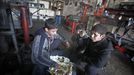 Gaza child labour 2012-02-23 00:00:00 epa03119003 Palestinian children having their lunch in a car repair workshop in the town of Beit Lahyia in northern Gaza on 23 February 2012. Reports state that child labor is widespread in the Gaza Strip because of the high rate of poverty and unemployment. Palestinain children leave school and go to work in an attempt to improve their standard of living, for low salaries because of lack of employment opportunities in Gaza. EPA/ALI ALI