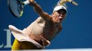 Caroline Wozniacki of Denmark serves to Maria Sharpova of Russia during their match at the 2014 U.S. Open tennis tournament in New York