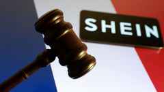 Illustration shows Shein logo, court gavel and France flag