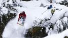 Austrian freeride skiers Mathias Haunholder (R) and Rohrmoser jump off a cliff during a freeride skiing tour on Sonnenkopf mountain in Langen am Arlberg December 10, 2012. Backcountry or freeride skiers ski away from marked slopes with no set course or goals, in untamed snow, generally in remote mountainous areas. Picture taken December 10, 2012. REUTERS/ Dominic Ebenbichler (AUSTRIA - Tags: SPORT SKIING SOCIETY) Published: Led. 21, 2013, 10:18 dop.