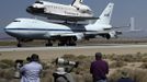 Photographers take photos of the Space Shuttle Endeavour carried piggyback atop a Boeing 747 jumbo jet, making its last and final landing at Edwards Air Force Base in California, September 20, 2012, after a cross-country trip to Los Angeles to begin its final mission as a museum exhibit. Endeavour is scheduled to take off for its final ferry flight again on Friday, and the final airborne journey of the entire space shuttle fleet, headed for Los Angeles International Airport. REUTERS/Gene Blevins (UNITED STATES - Tags: TRANSPORT SCIENCE TECHNOLOGY MEDIA)