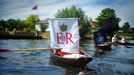 Swans and cygnets are caught, measured, assessed and tagged on the River Thames during the annual Swan Upping ceremony in London 100861, LONDON, UNITED KINGDOM - Monday J