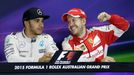 Third placed Ferrari driver Sebastian Vettel of Germany gestures next to race winner Mercedes Formula One driver Lewis Hamilton of Britain during a news conference after