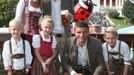 FC Bayern Munich's Robben, his wife Bernadien, their children and Mueller pose during their visit at the Oktoberfest in Munich