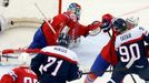 Norway's goalie Lars Haugen (top) fails to save a goal of Slovakia's Tomas Tatar (R) during the first period of their men's ice hockey World Championship group A game at