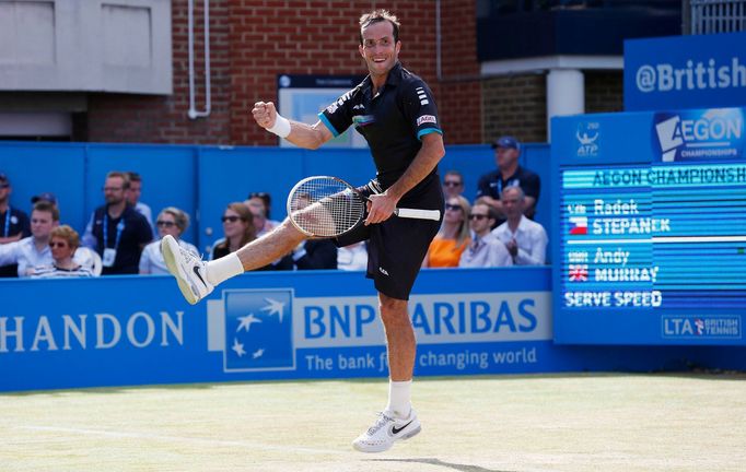 Czech Republic's Radek Stepanek celebrates winning his match against Britain's Andy Murray at the Queen's Club Championships in west London June 12, 2014. REUTERS/Suzanne