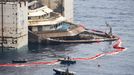 The bow of the Costa Concordia cruise liner is seen as it emerges during the refloating operation at Giglio harbour July 20, 2014.