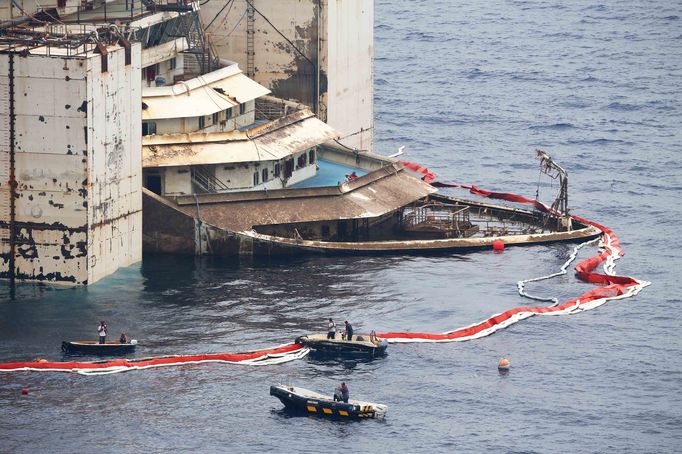 The bow of the Costa Concordia cruise liner is seen as it emerges during the refloating operation at Giglio harbour July 20, 2014.