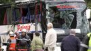 Police and rescue services work at the site of a bus accident near Dunkirk, northern France, August 8, 2007. The bus, carrying Polish tourists, crashed on Wednesday killing three people and seriously injuring 11 others, French police said. REUTERS/Jean-Pierre Rafto (FRANCE)