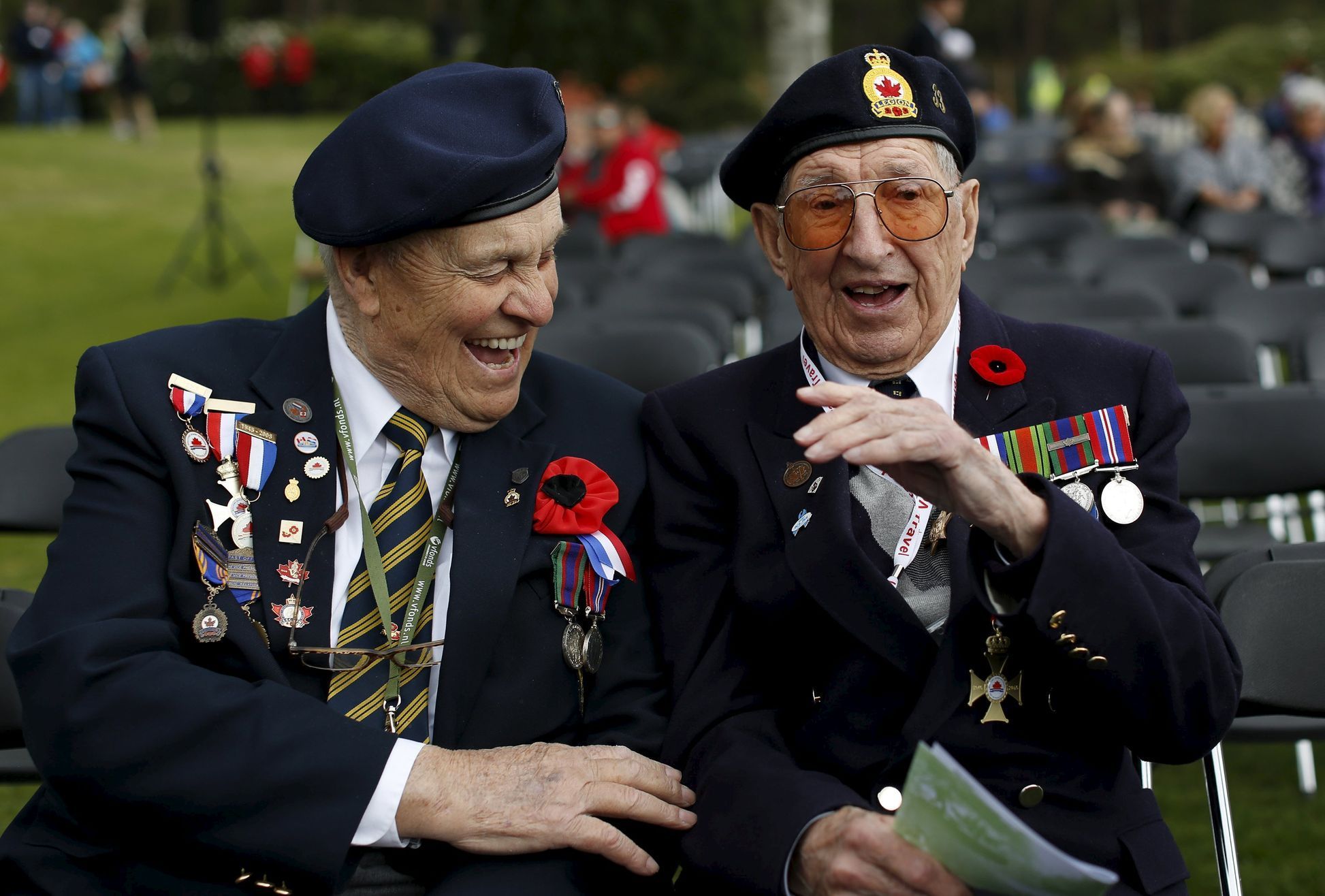 Canadian WWII veterans Reynolds and Nightingale a ceremony on the eve of the 70th anniversary of the liberation of the Netherlands at the Canadian War Cemetery in Holten