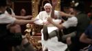 Children dressed in traditional Bavarian costumes dance for Pope Benedict XVI during the Pontiff's 85th birthday celebrations in the Clementine hall at the Vatican