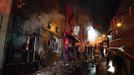 Fire-fighters try to extinguish a fire at Kiss nightclub in the southern city of Santa Maria, 187 miles (301 km) west of the state capital of Porto Alegre, in this picture taken by Agencia RBS, January 27, 2013. At least 200 people were killed in the nightclub fire in southern Brazil on Sunday after a band's pyrotechnics show set the building ablaze, and fleeing patrons were unable to find the emergency exits, local officials said. Bodies were still being removed from the Kiss nightclub in the southern city of Santa Maria, Major Gerson da Rosa Ferreira, who was leading rescue efforts at the scene for the military police, told Reuters. Local officials said 180 people were confirmed dead, and Ferreira said the death toll would rise above 200. He said the victims died of asphyxiation, or from being trampled, and that there were possibly as many as 500 people inside the club when the fire broke out at about 2:30 a.m. REUTERS/Germano Roratto/Agencia RBS (BRAZIL - Tags: DISASTER TPX IMAGES OF THE DAY) NO SALES. NO ARCHIVES. ATTENTION EDITORS - THIS IMAGE WAS PROVIDED BY A THIRD PARTY. FOR EDITORIAL USE ONLY. NOT FOR SALE FOR MARKETING OR ADVERTISING CAMPAIGNS. THIS PICTURE IS DISTRIBUTED EXACTLY AS RECEIVED BY REUTERS, AS A SERVICE TO CLIENTS. BRAZIL OUT. NO COMMERCIAL OR EDITORIAL SALES IN BRAZIL Published: Led. 27, 2013, 1:19 odp.