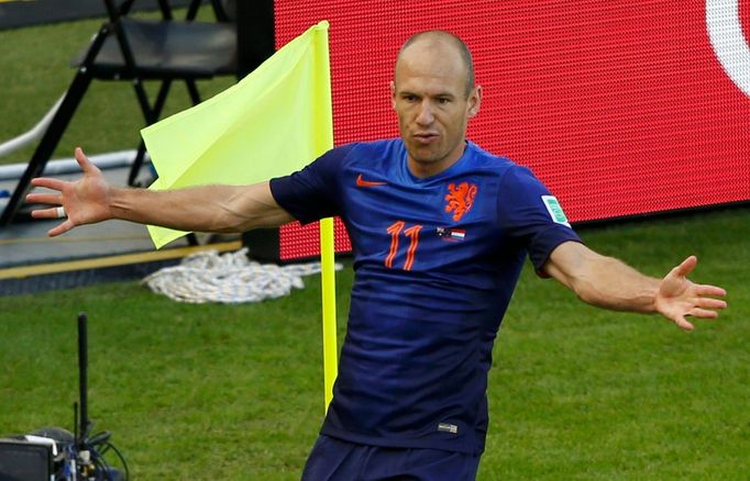 Arjen Robben of the Netherlands celebrates after scoring a goal against Australia during their 2014 World Cup Group B soccer match at the Beira Rio stadium in Porto Alegr