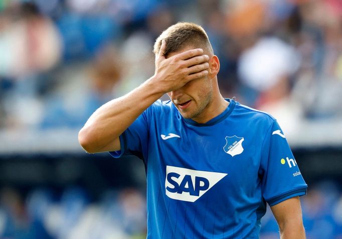 Soccer Football - Bundesliga - TSG 1899 Hoffenheim v Bayer Leverkusen - PreZero Arena, Hoffenheim, Germany - September 14, 2024 TSG 1899 Hoffenheim's Pavel Kaderabek reac