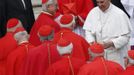 Pope Francis (R) talks with cardinals at the end of a canonization mass in Saint Peter's Square at the Vatican May 12, 2013. The Pope led a mass on Sunday for candidates for sainthood Antonio Primaldo, Mother Laura Montoya and Maria Guadalupe Garcia Zavala.