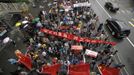 Demonstrators with banners and Chinese national flags march along the main road during a protest against Japan's decision to purchase disputed islands, called Senkaku in Japan and Diaoyu in China, outside the Japanese embassy in Chengdu September 16, 2012. Torrid protests against Japan broke out in Chinese cities for a second day on Sunday, prompting Japanese Prime Minister Yoshihiko Noda to urge Beijing to protect his country's companies and diplomatic buildings from fresh assaults. REUTERS/Jason Lee (CHINA - Tags: POLITICS CIVIL UNREST)