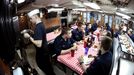 April 24, 2011 - Cape Canaveral, Florida, U.S. - -- Cape Canaveral, Fla. -- US Navy enlisted men eat lunch in the Crew's Mess aboard the USS Annapolis (SSN 760), a S6G nuclear reactor powered fast attack submarine, sailing from Cape Canaveral on Sunday. The USS Annapolis measures 362 ft. in length and 33 ft. at the beam, a diving depth of over 400 ft., 27+ mph, 12 vertical launch missile tubes, 4 torpedo tubes, and a crew of 130 enlisted submariners. The submarine was commissioned April 11, 1992 with its homeport in Groton, Connecticut. USS Annapolis sailed to the 21st Anniversary of Fleet Week at Port Evergl