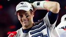 Feb 1, 2015; Glendale, AZ, USA; New England Patriots quarterback Tom Brady (12) celebrates with the Lombardi Trophy after beating the Seattle Seahawks in Super Bowl XLIX