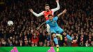 Barcelona's Daniel Alvés in action with Arsenal's Olivier Giroud