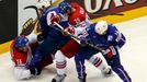 Ondrej Vitasek (L) and Jan Kolar (2nd R) of the Czech Republic battle for the puck with France's Antoine Roussel (2nd L) and Stephane da Costa (R) during the first period